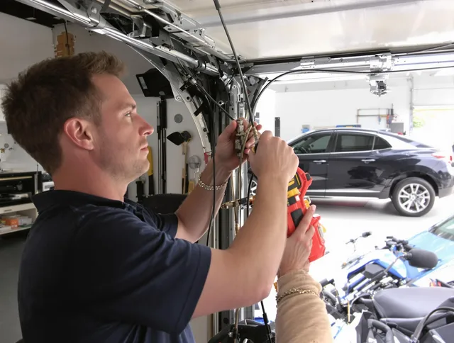 Largo Garage Door Repair safety certified technician performing cable replacement in Largo