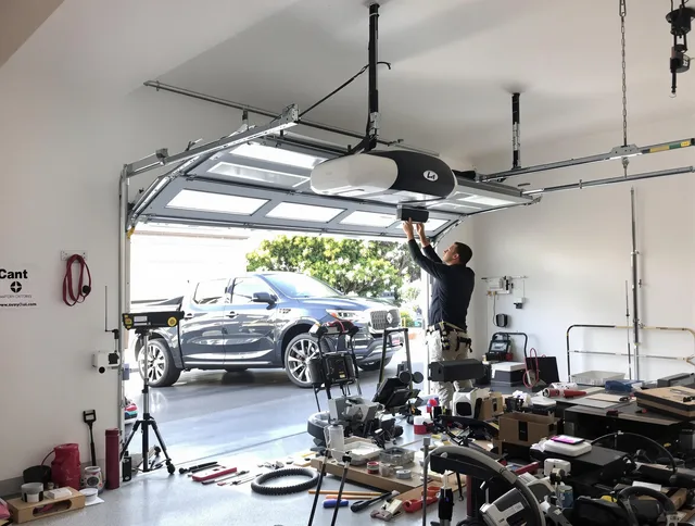 Largo Garage Door Repair specialist installing smart garage door opener system in Largo home