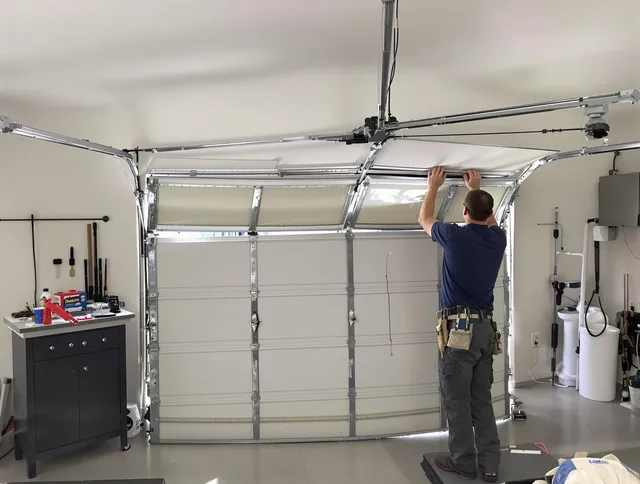 Largo Garage Door Repair specialist performing precise section replacement on Largo garage door