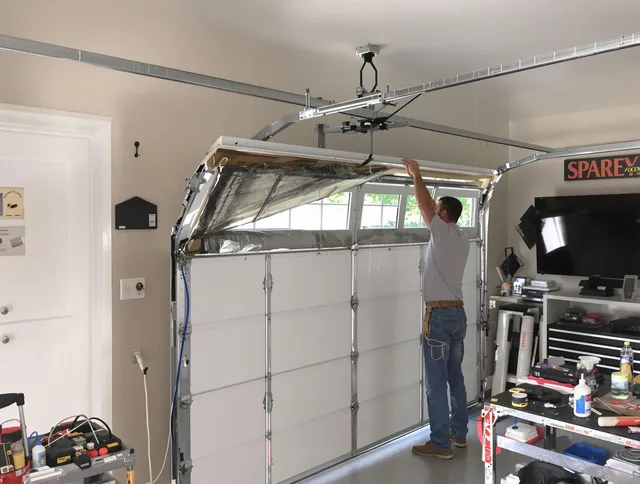 Garage door section replacement by Largo Garage Door Repair in Largo